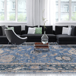 Blue large Oushak rug in a modern design living room with contemporary black furniture