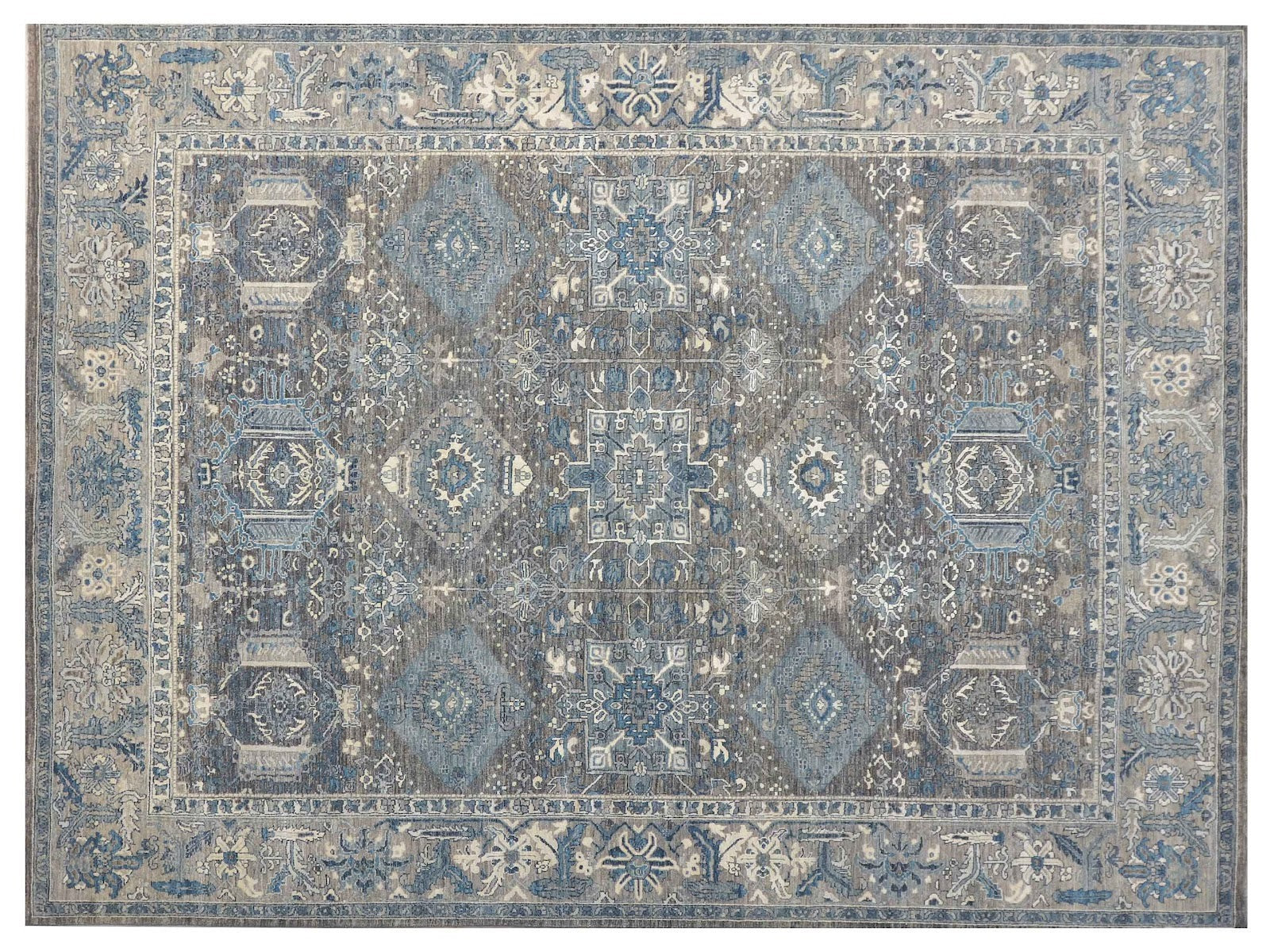 8x10 hand-knotted Ziegler rug with a geometric design in dark gray and gray borders, made from a luxurious silk and wool blend.