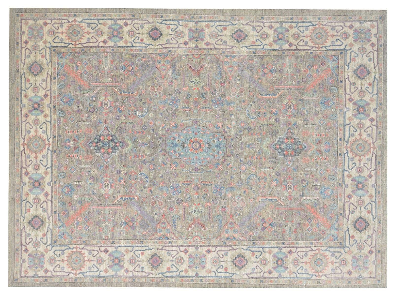 9x12 hand-knotted Ziegler wool rug showcasing traditional motifs in a palette of neutrals, blues, and pinks.