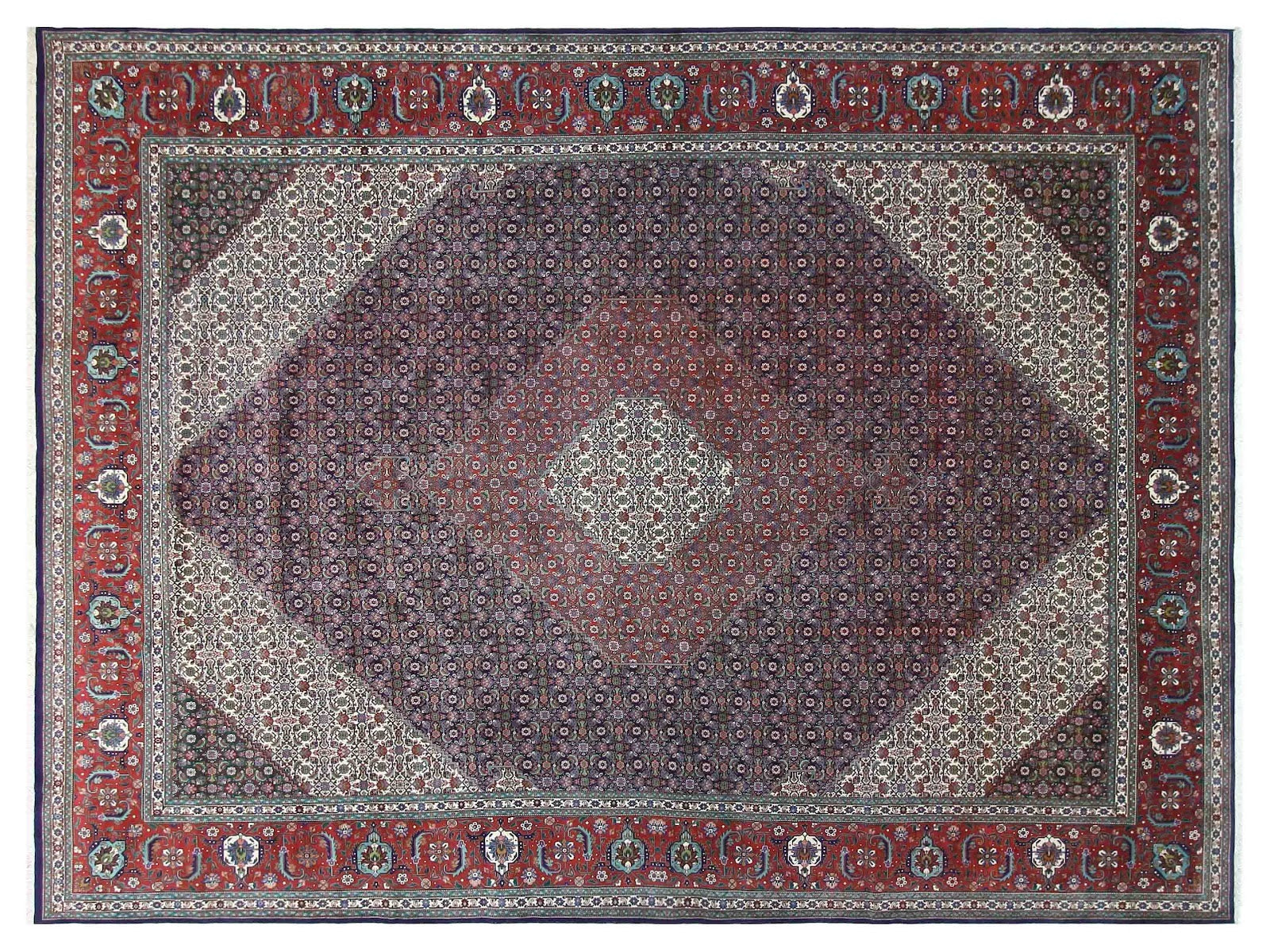 11x16 hand-knotted vintage Tabriz rug with navy blues, reds, and an ivory border, from the Vintage Tabriz Elite Collection