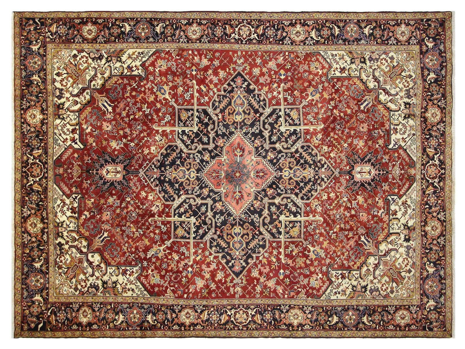 10x14 vintage Persian Serapi Heriz rug in navy with a red border and central medallion, hand-knotted in wool.