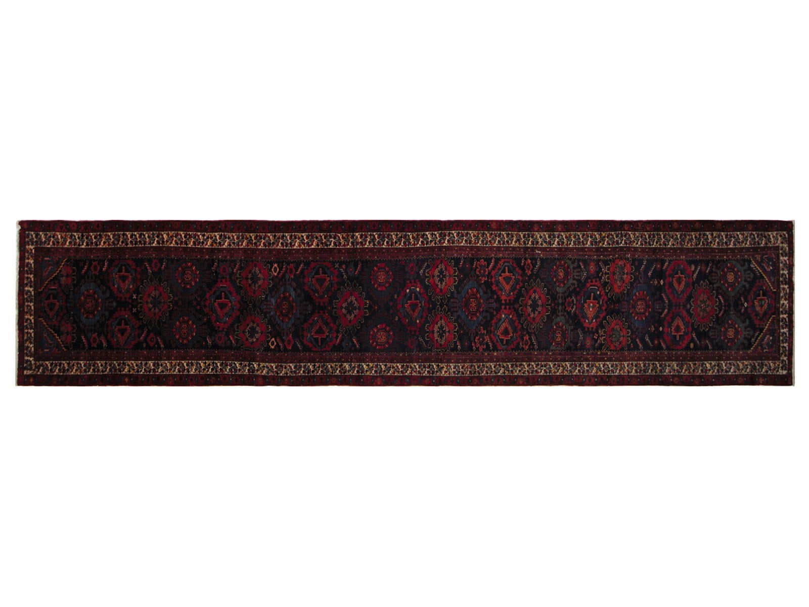 3x17 hand-knotted vintage Persian runner featuring traditional floral patterns in dark navy blues with red accents